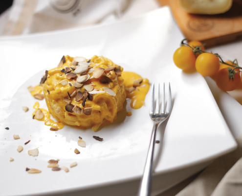 Pici con crema di Pecorino Toscano DOP e pomodorini gialli